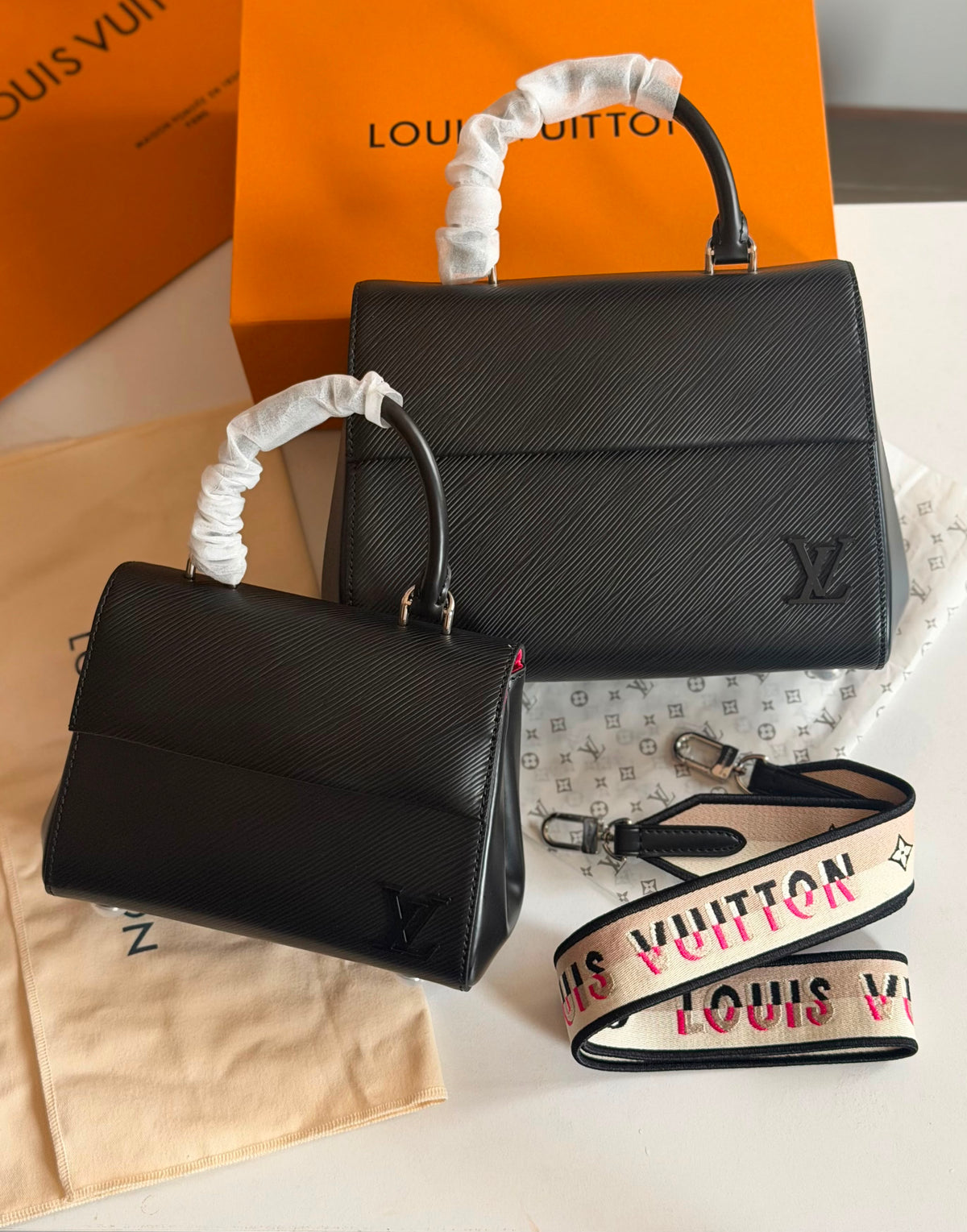 Louis Vuitton Cluny Handbag